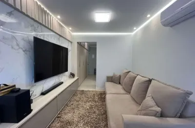 Apartamento com 1 dormitório para alugar, 60 m² por R$ 4.400,01/mês - Canto do Forte - Praia Grande/SP