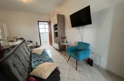Kitnet com 1 dormitório para alugar, 43 m² por R$ 1.650,01/mês - Tupi - Praia Grande/SP
