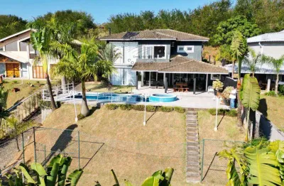 Casa à venda no condomínio riviera no jaguari com 5 suítes em piracaia-sp