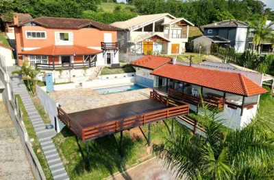 Casa à venda com vista para a represa no condomínio riviera do jaguari em piracaia-sp
