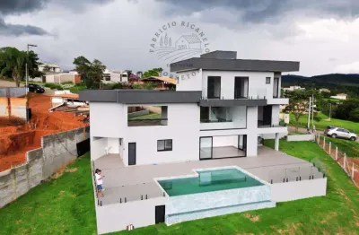 Casa com 4 suítes no condomínio entre serras e águas em vargem-sp