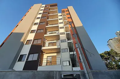 Apartamento novo 2 dormitórios, uma suíte, varanda, elevador, uma vaga - passos