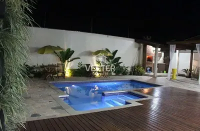 Casa com 3 dormitórios à venda, 284 m² por R$ 1.600.000,00 - Portal Do Sol - Tremembé/SP