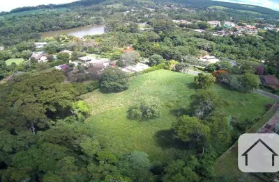 Excelente oportunidade! terreno de 5740 m² em condomínio fechado, com a maior parte do terreno plano, ideal para construir sua residência dos sonhos.