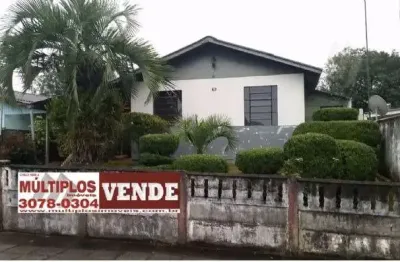 Oportunidade única: casa à venda no centro de palmeira-pr, com 2 quartos, sala ampla, 2 vagas de garagem e 60m² de área.