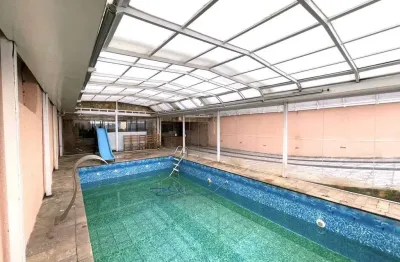 Sobrado com 4 dormitórios para alugar, 478 m² por R$ 6.150,00/mês - Jardim Las Vegas - Santo André/SP