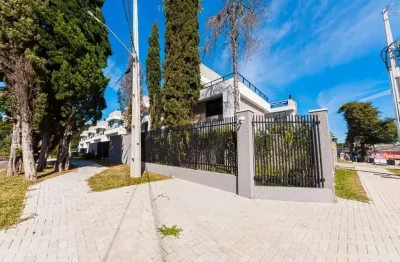 Casa em condomínio fechado em santa felicidade, 3 suítes, 2 vagas, ático com churrasqueira