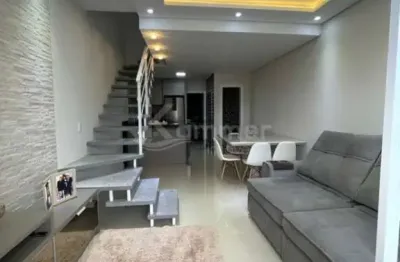 Sobrado mobiliado em balneário piçarras, 2 dormitórios sendo 1 com móveis sob medida, closet e sacada