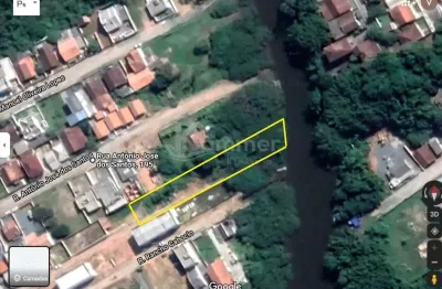 Incrível terreno beira rio em balneário piçarras, com um total de 1231m², sendo 924m² na escritura