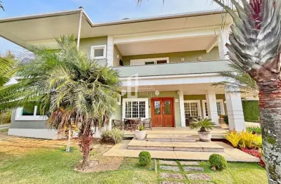 Imponente casa em condomínio com 5 suítes e 537m² na várzea, teresópolis-rj - a oportunidade dos seus sonhos!