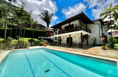 Imponente casa de alto padrão em condomínio exclusivo de teresópolis - 494m², 6 quartos e 4 suítes!