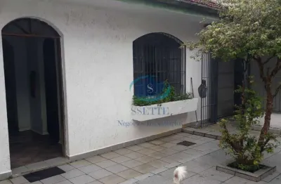Casa térrea com 4 dormitórios,1 suíte,2 salas,4 banheiros,entrada lateral,4 vagas de garagem,aceita proposta.