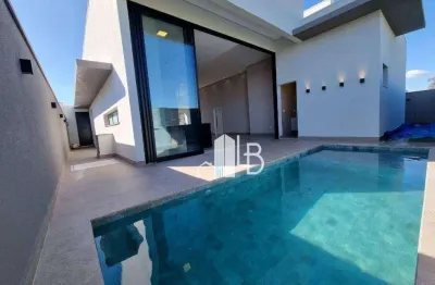 Casa alto padrão no condomínio arts com três suítes, escritório com lavabo e área gourmet completa.