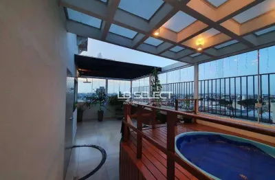 Cobertura no bairro santa mônica com quatro quartos e área gourmet.