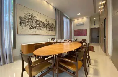Casa térrea com três suítes, escritório com lavabo e área gourmet completa.