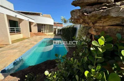Casa alto padrão no bairro jardim karaíba com três suítes e varanda gourmet completa.