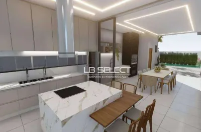 Casa no condomínio splêndido com três suítes e varanda gourmet.