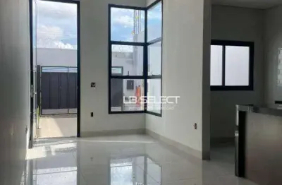 Casa com três quartos sendo uma suíte, jardim de inverno e garagem para dois carros.