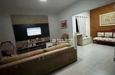 Casa no bairro umuarama com três quartos, varanda gourmet e três vagas de garagem.