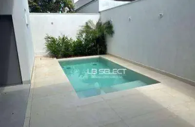 Casa no condomínio splêndido com três suítes, escritório e varanda gourmet.