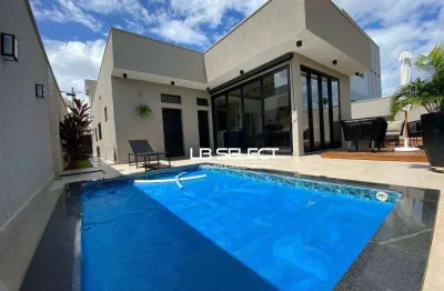 Casa no condomínio splendido com três suítes e varanda gourmet.