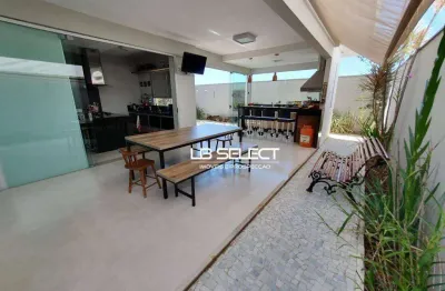 Casa no condomínio splendido com três quartos e varanda gourmet.