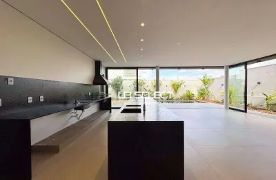Casa no condomínio alphaville ii com quatro suítes e varanda gourmet completa.