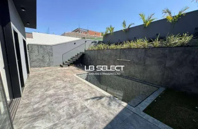 Casa no condomínio terras alpha com quatro suítes e varanda gourmet.