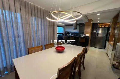 Apartamento com três quartos, cozinha gourmet com churrasqueira à carvão e duas vagas livres de garagem.
