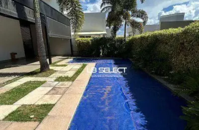 Casa no condomínio paradiso ecológico com quatro quartos e varanda gourmet completa.