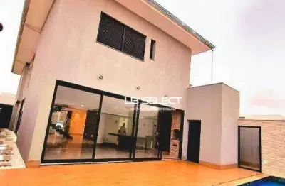 Casa no condomínio varandas sul com cinco quartos e varanda gourmet.