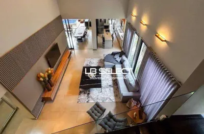 Casa nocondomínio splêndico com três suítes e área gourmet completa.