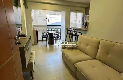Apartamento no grand ville cm dois quartos, banheiro social e sala com sacada.