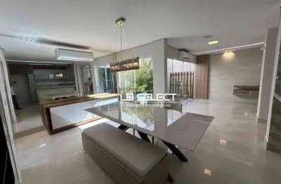 Casa no condomínio village paradiso com três suítes e varanda gourmet.