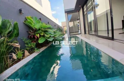 Casa no condomínio splêndido com três suítes e varanda gourmet.