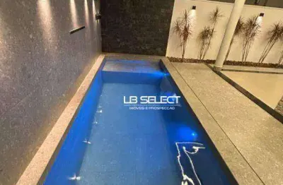 Casa no condomínio splêndido com três suítes e varanda gourmet.