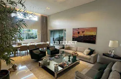 Casa no Condomínio Rerserva do Vale com quatro suítes e varanda gourmet completa.