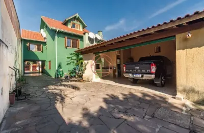 Casa com 4 quartos à venda na beco circular, 722, vila jardim, porto alegre por r$ 799.900
