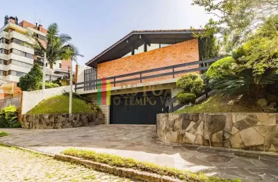 Casa com 4 quartos à venda na travessa java, 76, jardim lindóia, porto alegre por r$ 1.350.000