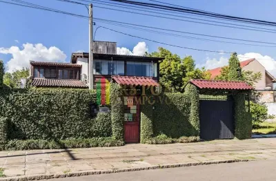 Casa com 3 quartos à venda na avenida guarujá, 140, guarujá, porto alegre por r$ 749.000