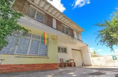 Casa com 5 quartos à venda na rua joão bastian, 24, três figueiras, porto alegre por r$ 1.280.000