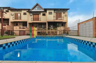 Casa em condomínio fechado com 3 quartos à venda na rua doutor egon renner, 135, ipanema, porto alegre por r$ 590.000