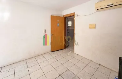 Apartamento com 2 quartos à venda na Rua Doze, 124, Guajuviras, Canoas por R$ 95.000