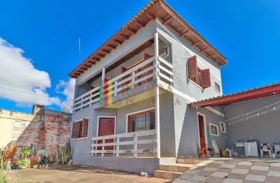 Casa com 3 quartos à venda na Rua Mathilde Zatar, 87, Nonoai, Porto Alegre por R$ 550.000
