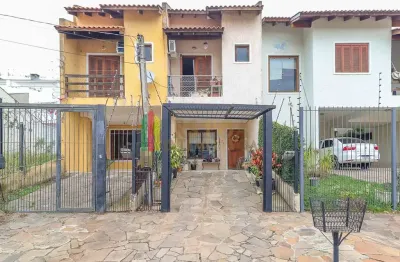 Casa com 2 quartos à venda na Rua Giobatta Giuseppe Petracco, 237, Vila Nova, Porto Alegre por R$ 349.000