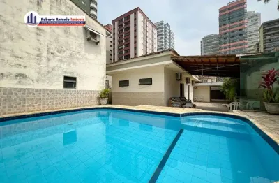 Casa com 5 quartos à venda no canto do forte, praia grande  por r$ 2.650.000