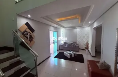 Vendo casa de 5/4 sendo 02 suítes com 03 salas e 03 vagas de uso mixto residenci