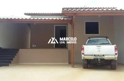 Vendo casa solta semi nova com 3/4 sendo 02 suites, garagem para até 03 carros n