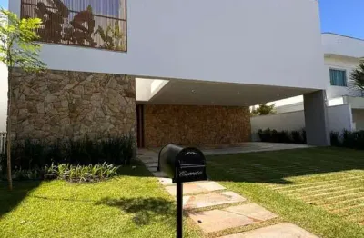 Casa duplex de luxo com 4 suítes em uberlândia no condomínio jardins gênova pronta para morar: 6 vagas, piscina, área gourmet, escritório, 400m2