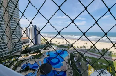 Excelente apartamento 3 dormiórios, 1 suíte, varanda com churrasqueira, vista mar, andar alto, 2 vagas, pé na areia e estrutura de clube